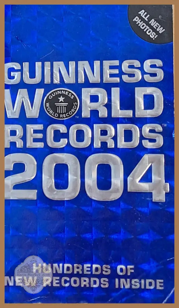 Guinness World Records 2004 - Claire Folkard Ernst and Young - Книги